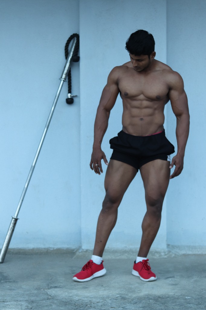 Coach with barbell